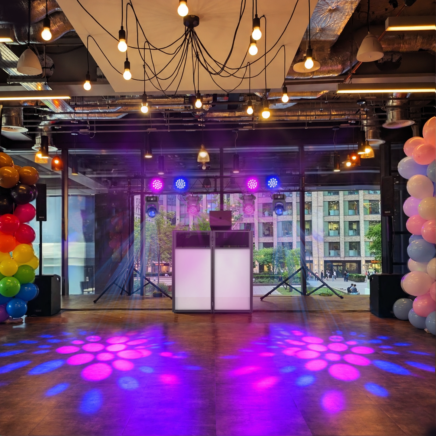 Corporate function DJ My DJ booth, speakers and moving-head lighting set up in a function space, as it arrives at a venue